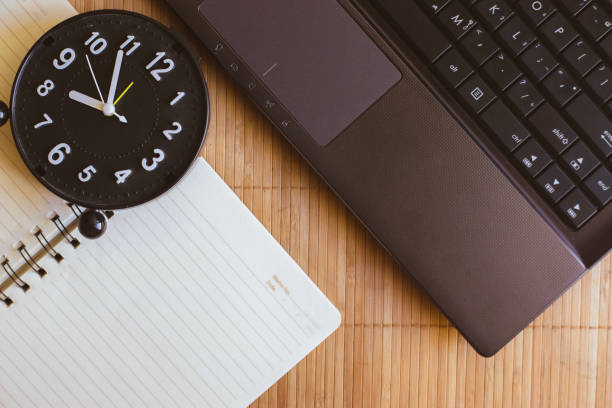 istock notepad, pencil with notebook on wood board background.using wallpaper for education, business photo.Take note of the product for book with paper and concept, object or copy space. 886732772