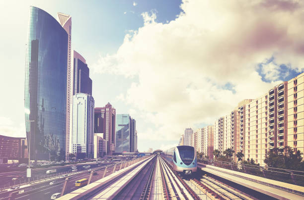 istock Metro train in Dubai downtown, United Arab Emirates. 886733818