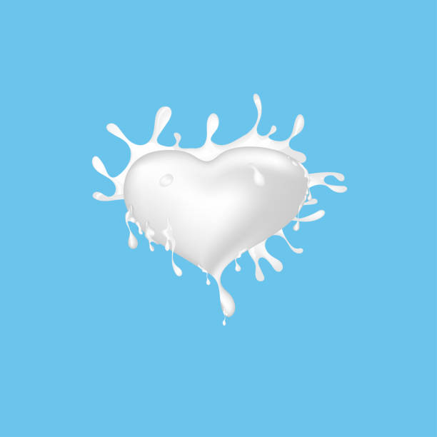 istock Vector of milk splash shape heart. Splash of milk on blue background. 886739928