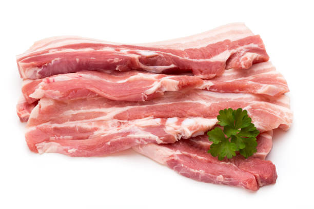 istock Meat pork slices isolated on the white background. 886747734
