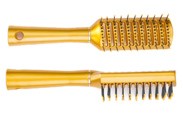 istock Two yellow hair brushes isolated on white background 886756502