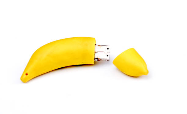 забавный usb флэш драйв, банановый дизайн, - hard drive symbol ideas concepts стоковые фото и изображения