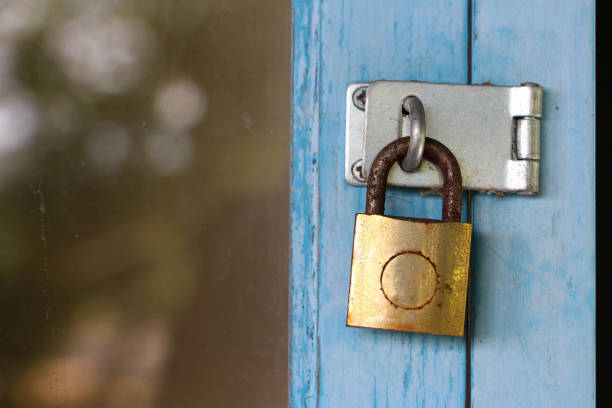 istock Padlock Hang on the Blue Door 886761484