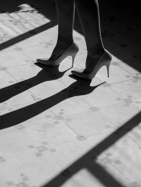 istock Close up woman legs in high heels 886765918