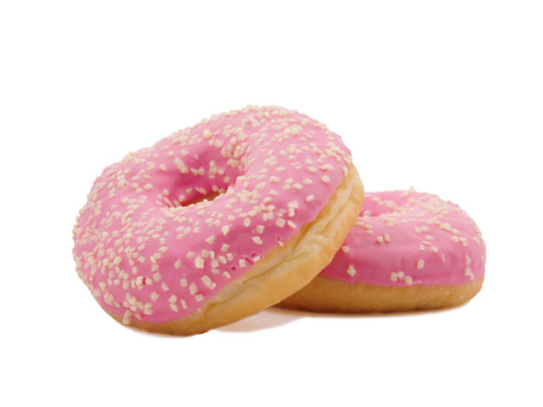 istock Donut on the front leaning on another donut on a white isolated background 886779856