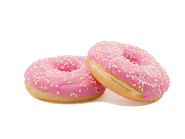 istock Donut sideways leans on another donut on a white isolated background 886781456