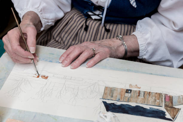 istock Working Hands -- An Artist Painting A Picture (Horizontal) 886782090