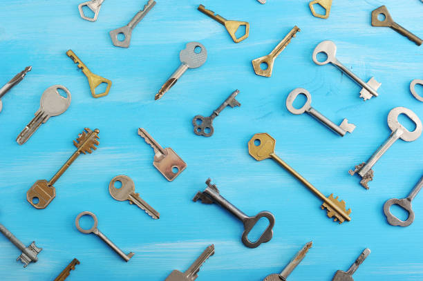 istock background from various keys on a blue wooden background 886782244