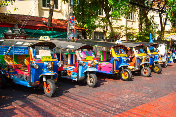 tuk tuks in , bangkok - jinrikisha thailand tuk transportation imagens e fotografias de stock