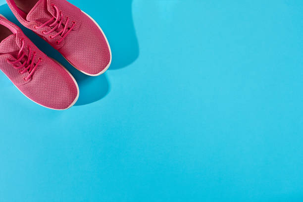 Close up of shoes of a woman running at the park