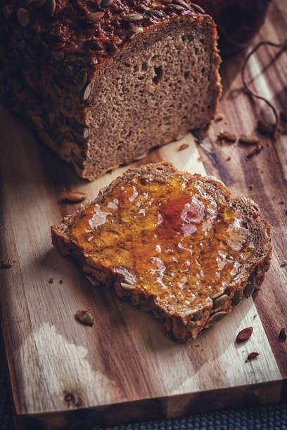 istock Fresh Homemade Brown Bread with Marmalade 886797238