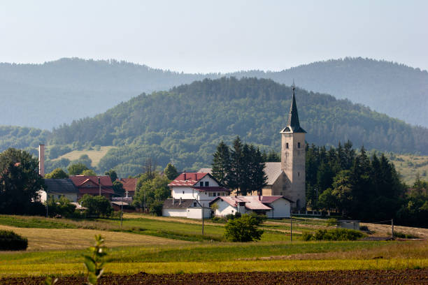 istock Tower in green landscape 886818688