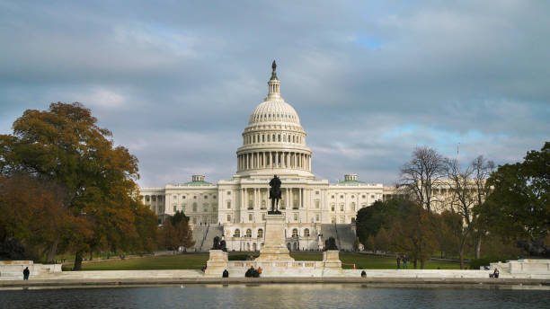 istock United States Capitol West Reflecting Pool in Washington, DC - 4k/UHD 886822114