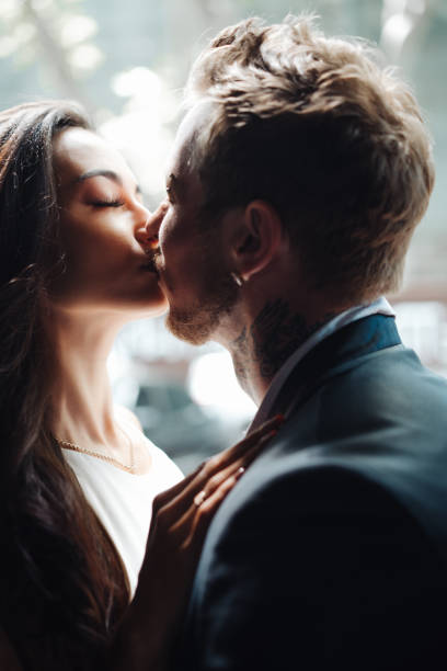 istock couple posing in the doorway 886830740