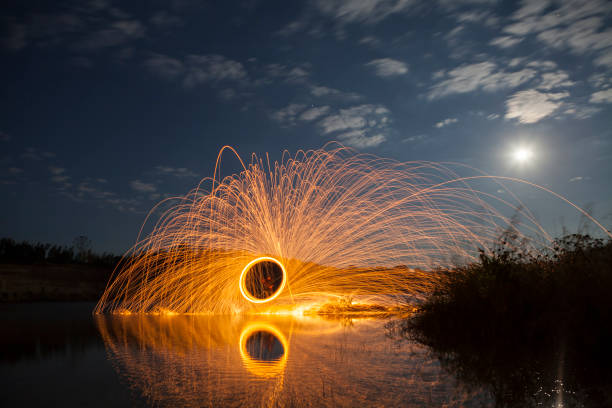 istock A ring of fire at the lake. 886837774