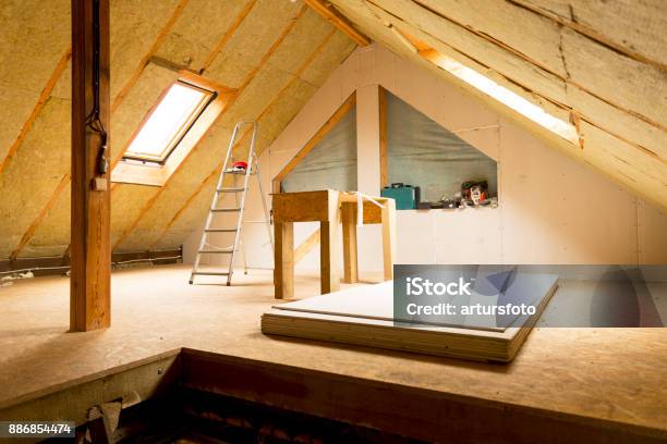 House Attic Under Construction Mansard Wall Insulation With Rock Wool Stock Photo - Download Image Now