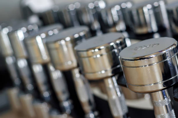 istock Closeup image of chrome dumbbells 886854642