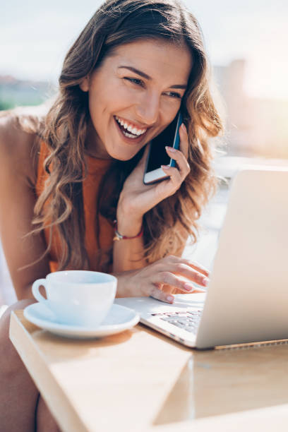 istock Modern businesswoman working outdoors 886858228
