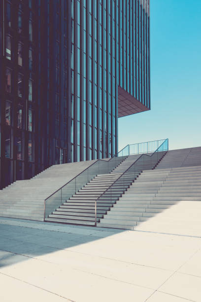 modern staircase in urban surrounding, media harbor duesseldorf, germany empty stairs and modern architecture at media harbor in duesseldorf, germany. architecture capital cities glass pattern stock pictures, royalty-free photos & images