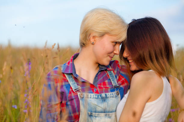 istock two girlfriends in the open air 886866260