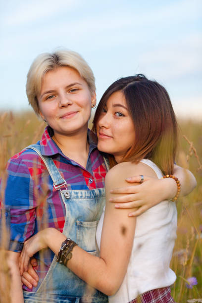 istock two girlfriends in the open air 886866818
