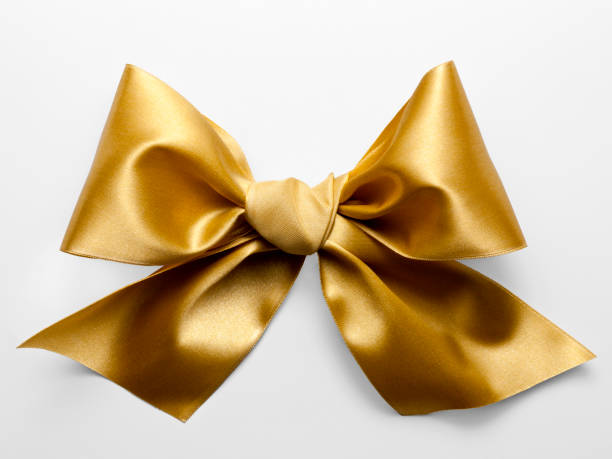 Golden Ribbon Bow isolated on White Background