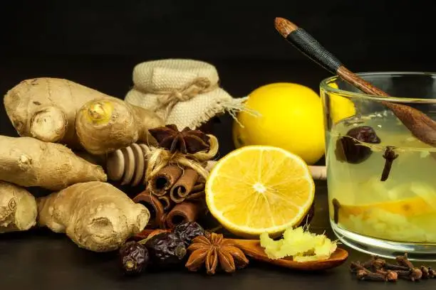 Ginger lemon honey and rosehip tea against influenza. Hot tea for colds. Home Pharmacy