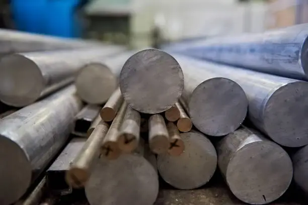 Photo of Pile of aluminium rods.