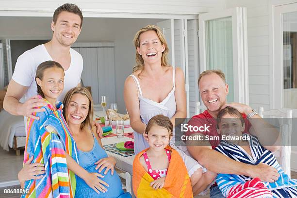 Family Smiling After Enjoying Swimming Stock Photo - Download Image Now - Nephew, Niece, Looking At Camera