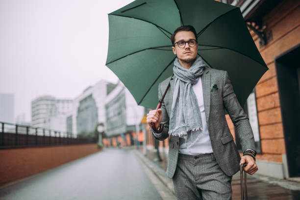 istock Travel man walking with suitcase 886895444