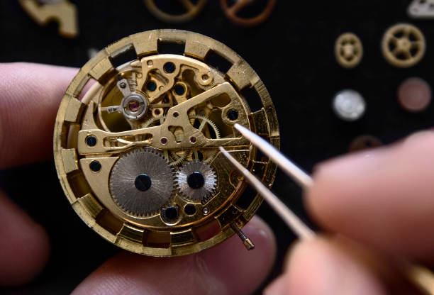 istock Watchmaker is repairing the mechanical watches in his workshop 886899836