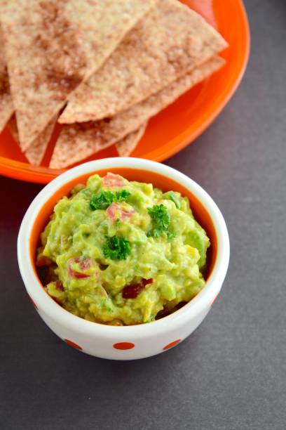 istock Homemade guacamole with tortilla chips 886907784
