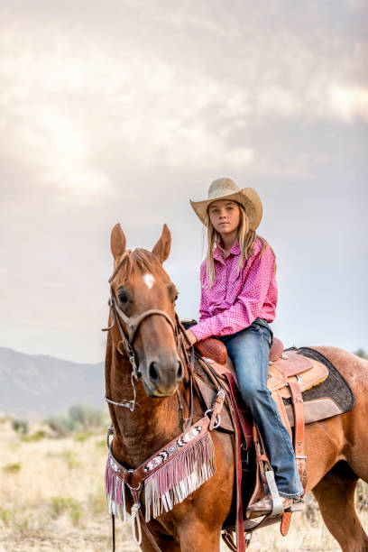 istock Strong Cowgirl Horseback Riding 886913136