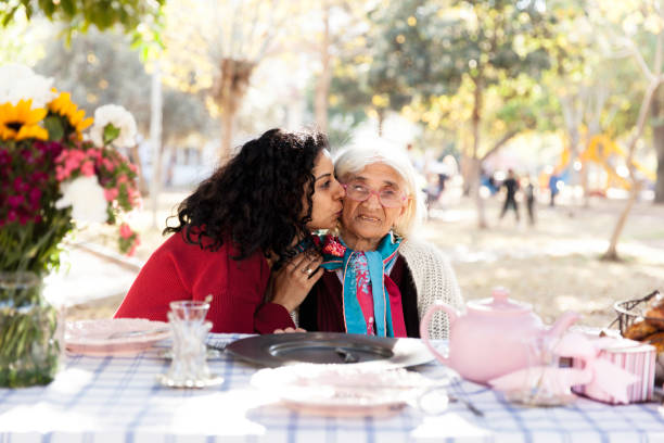 istock Kissing grandmother 886914094