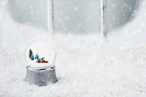 istock Snow Globe with Toy Truck 886921014