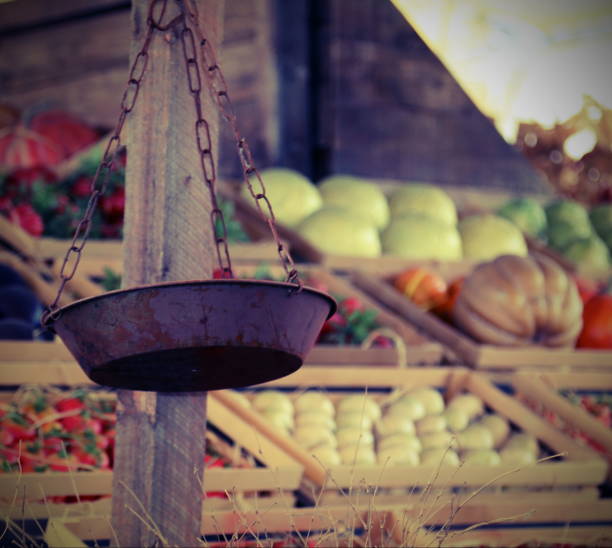 old rusty scales of a fruit and vegetable stall in the local market with vintage effect