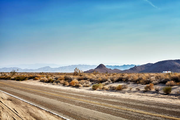 istock Desert highway, travel concept, USA. 886921808