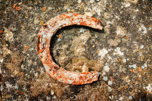 istock Old rusty talisman, a horseshoe is said to bring good luck 886921946