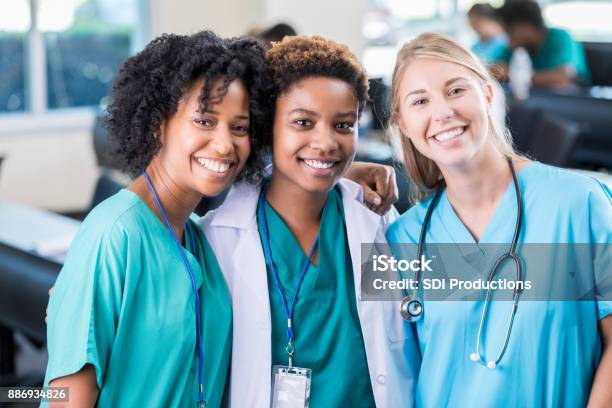 Confident Medical School Friends Stock Photo - Download Image Now - Nurse, Friendship, Multiracial Group
