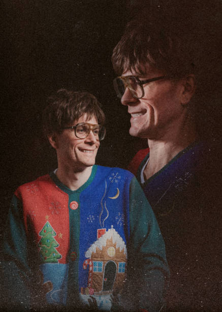 Retro Styled Glamour Shot with Christmas Sweater A worn portrait photograph styled after the 1970's and 1980's, with a profile headshot floating above the main subject. The man wears an ugly Christmas sweater. A nostalgic throwback to the photo albums of old. kitsch photos stock pictures, royalty-free photos & images