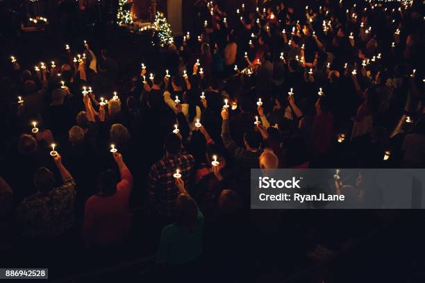 Candlelight Church Service On Christmas Eve Stock Photo - Download Image Now - Candle, Christmas, Religious Service
