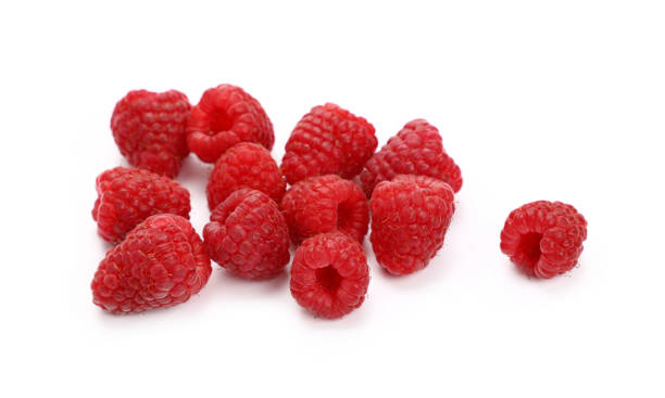 istock Fresh red ripe raspberries on white, close up 886942732