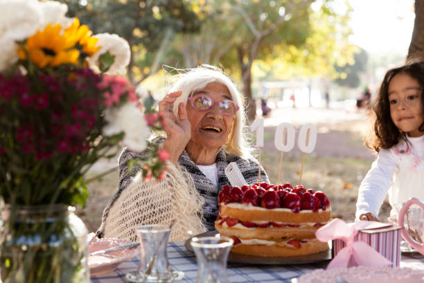 istock Over 100 senior women and grandson 886950682