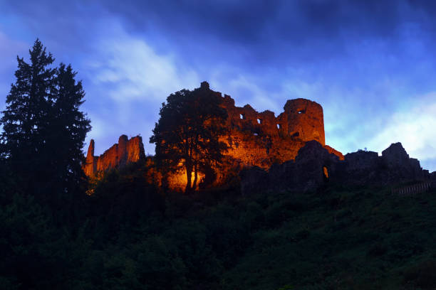 This table mountain called Königstein is located in the Elbe Sandstone Mountains. It rises 240 m above the Elbe and extends over almost 10 hectares. The table mountain rises imposingly out of the landscape. The view from the Bastei to the south over to Table Mountain is unique. Here it appears against the sky with the last glow of the clouds, illuminated by the evening sun, while the land is already sinking into darkness.