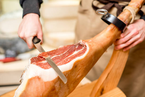 резка прошутто ноги - ham kitchen knife meat iberian стоковые фото и изображения