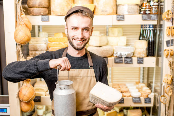 istock Cheese seller portrait 886956080