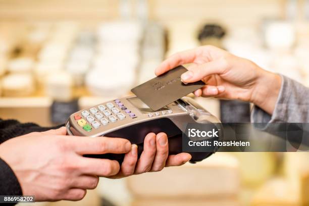Paying With Card In The Food Store Stock Photo - Download Image Now - Paying, Airport Terminal, Playing Card