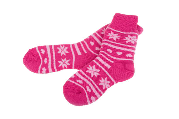 istock Pair of women's socks isolated on white background. 886958506