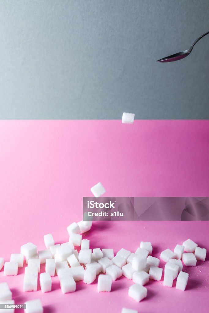 sugar cubes on spoon sugar cubes on spoon. space for text Cube Shape Stock Photo