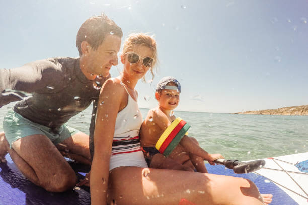istock Family on a paddle board 886963938